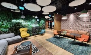 Office fit out Bucharest – modern renovated workspace showing furniture and lighting upgrades